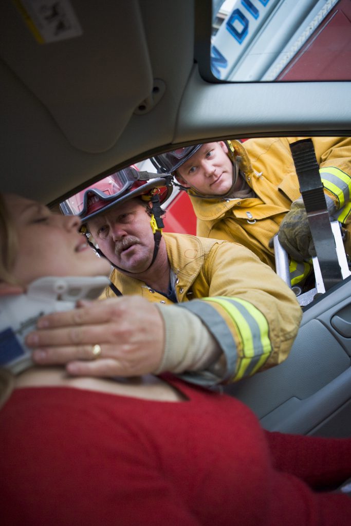 firefighters helping an injured woman in a car 2021 08 26 16 12 44 utc