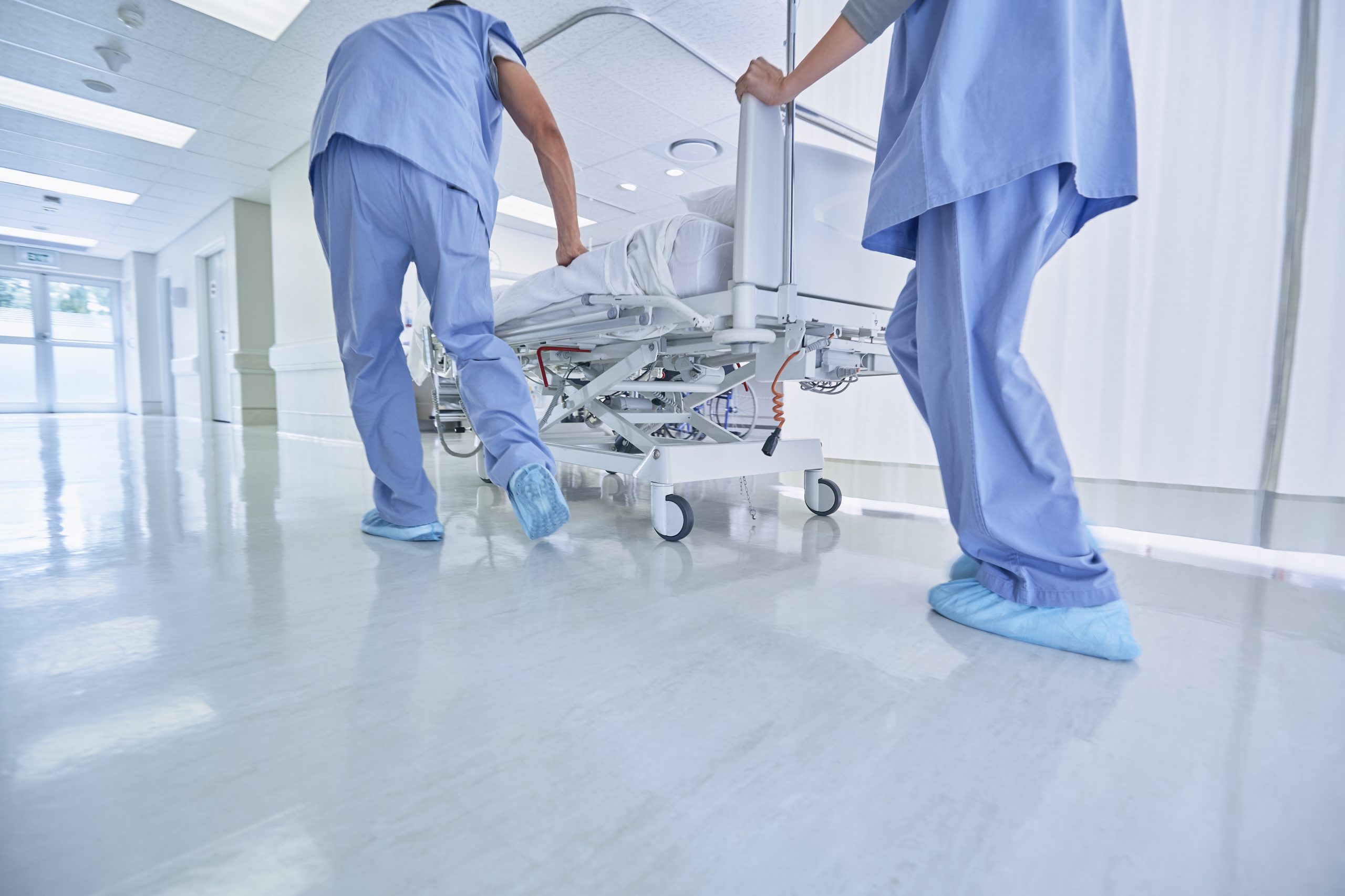 two medics urgently pushing hospital bed in corrid 2022 03 07 23 54 32 utc scaled